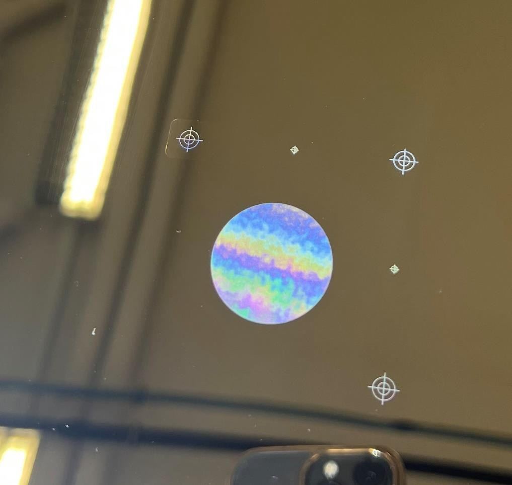 Interferenzmuster auf einer optischen Oberfläche